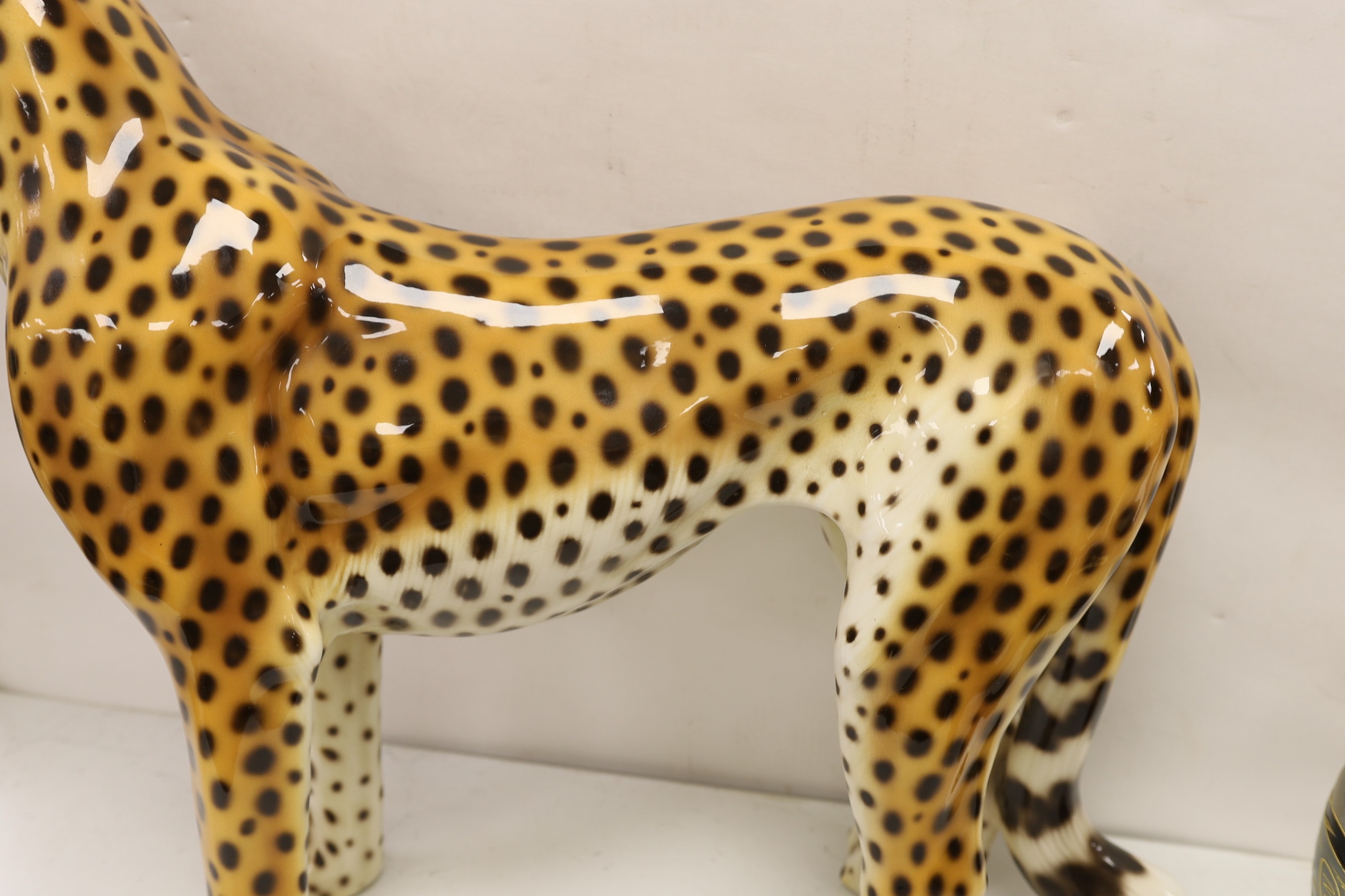 A large novelty ceramic leopard, 69cm tall